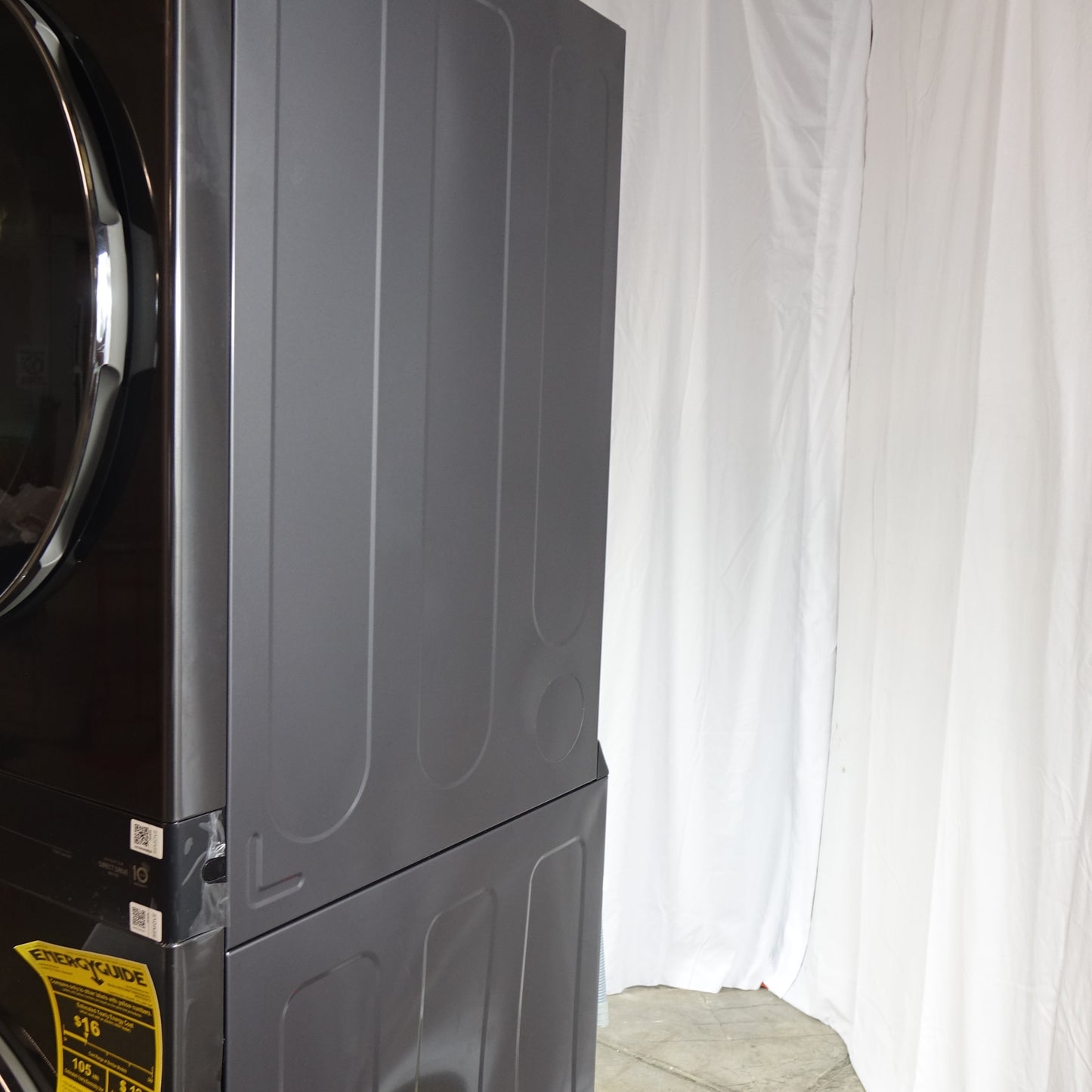 LG Stacked WashTower Front Load 4.5cu Washer & 7.4cu Electric Dryer (Black Steel