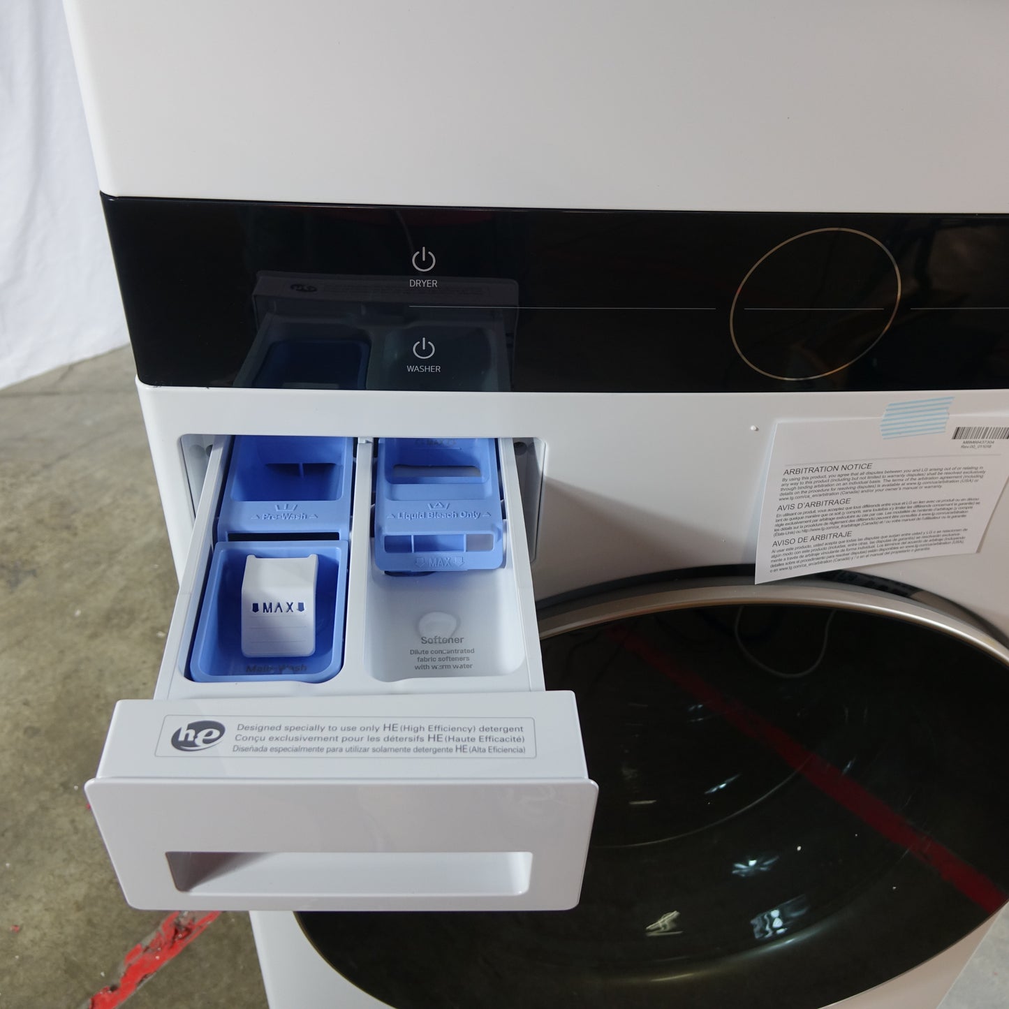 LG Stacked Laundry Center Front Load 4.5cu Washer & 7.4cu Electric Dryer (White)
