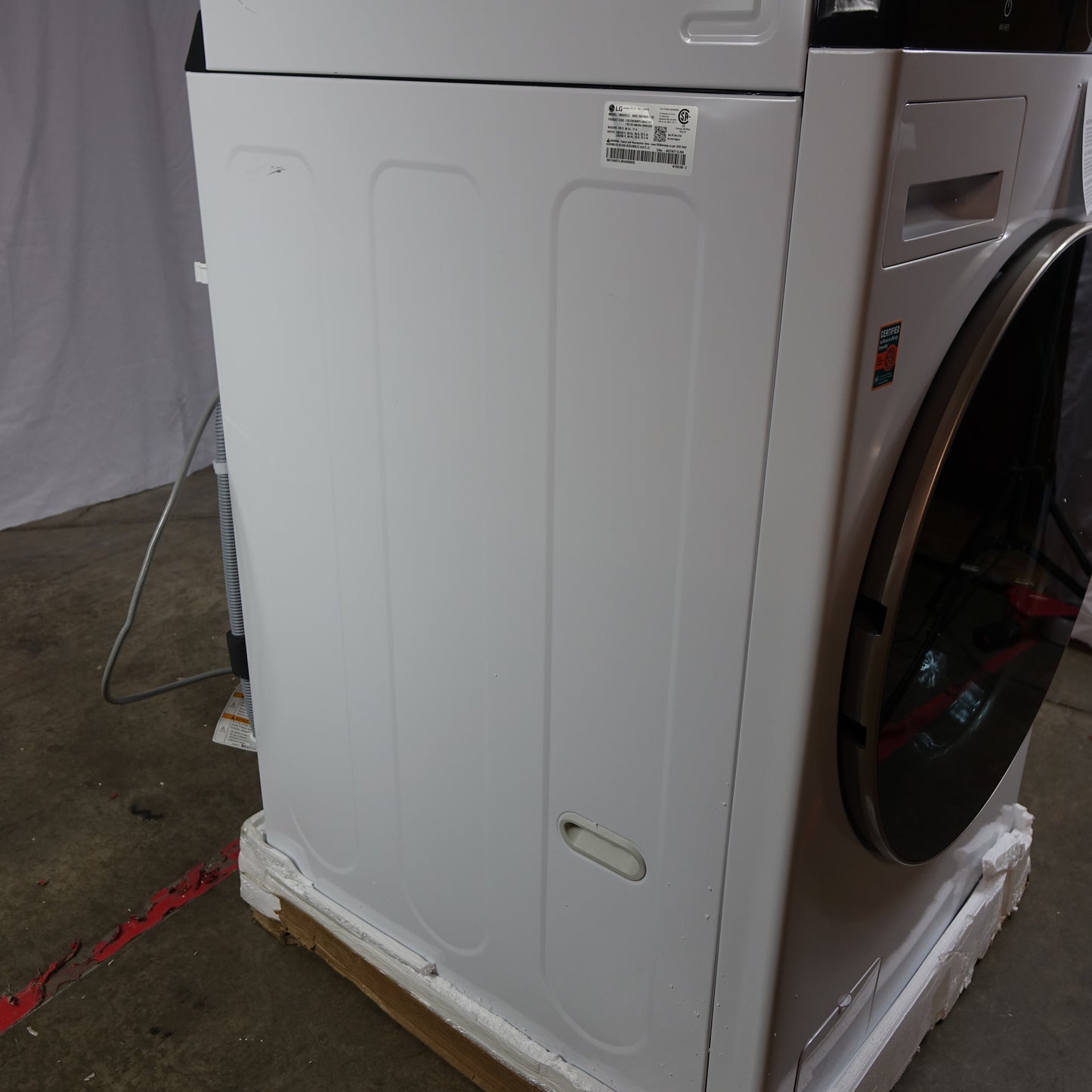 LG Stacked Laundry Center Front Load 4.5cu Washer & 7.4cu Electric Dryer (White)